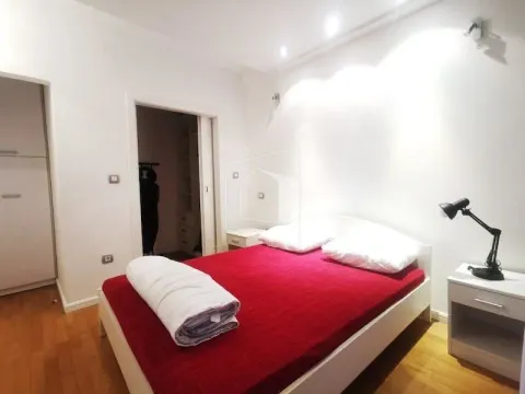 Bedroom with a double bed and bedside tables. - image 8