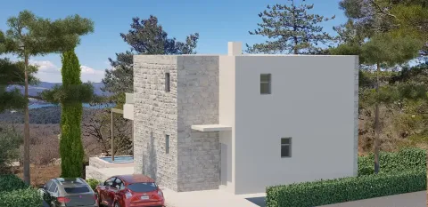 Spoljni izgled moderne kuće sa kamenom fasadom i dvorištem. - image 9