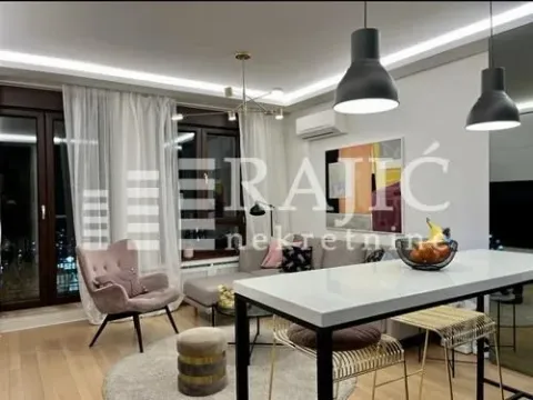 Modern living room with a dining area and access to the terrace. - image 14