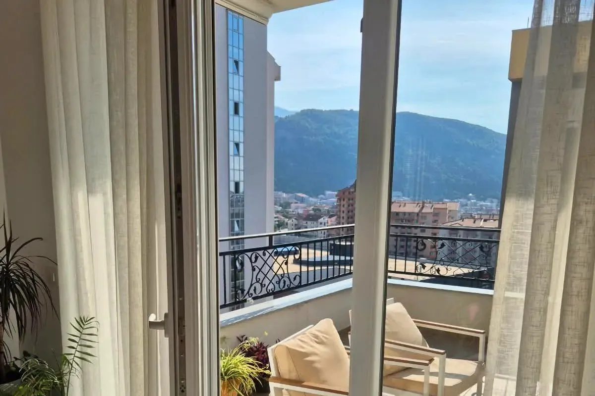 View from the terrace overlooking the city and mountains.