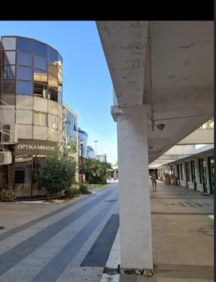 View of the promenade and commercial buildings within the complex.