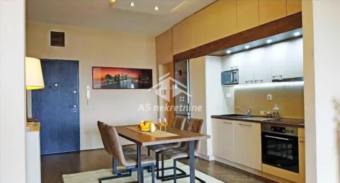 Kitchen with dining area and built-in appliances. - image 5