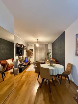 Spacious living room with a dining area and modern furniture. - image 6