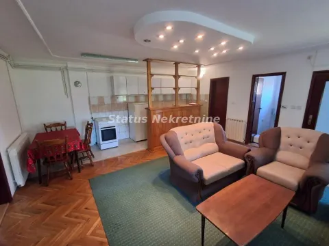 Living room with dining area and open-plan kitchen. - image 12