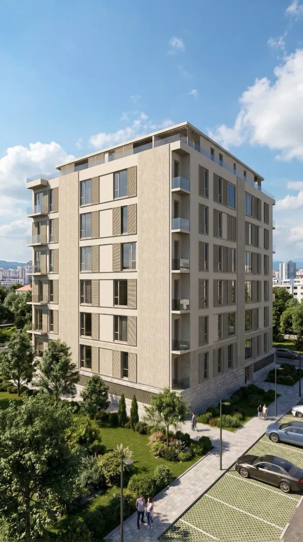 Spoljašnji izgled moderne stambene zgrade sa uređenim dvorištem i parkingom.