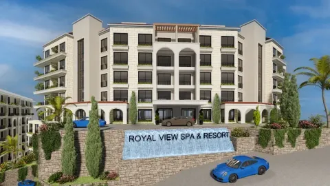 Front view of a multi-story complex building with landscaped yard and parking. - image 9