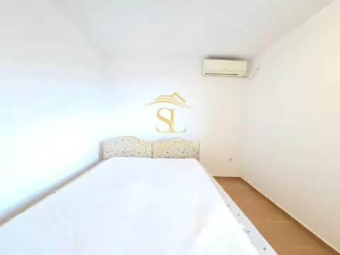 Bedroom with a double bed and air conditioning. - image 10