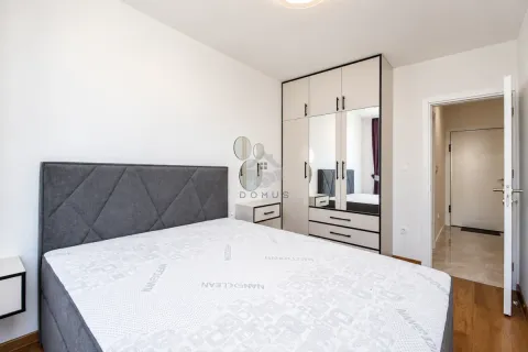 Bedroom with a double bed, large mirrored wardrobe, and a view of the hallway. - image 6
