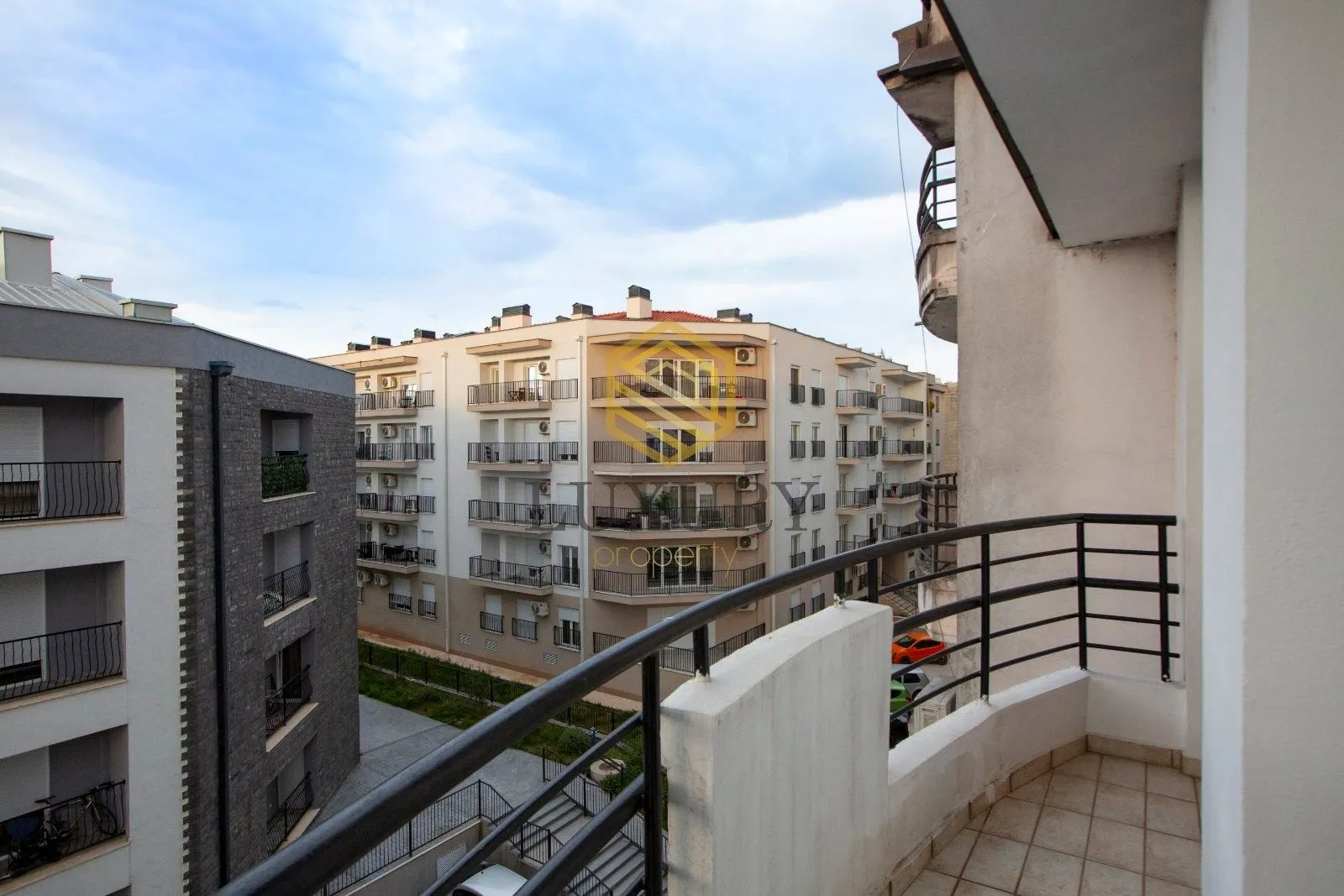 View from the terrace towards the surrounding residential buildings.