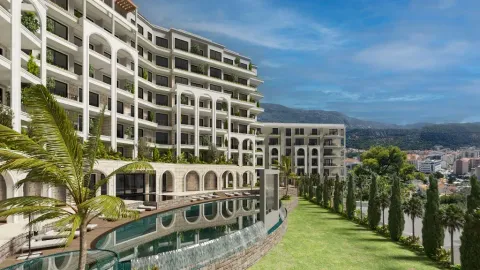 Exterior view of the residential complex with a swimming pool and landscaped courtyard. - image 5