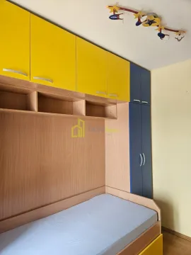 Children's bedroom with a bed and built-in wardrobes in cheerful colors. - image 9