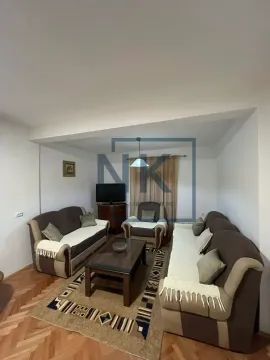 Living room with a seating set and a coffee table. - image 2