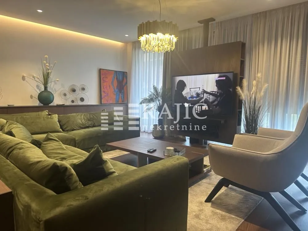 Modern and bright living room with a comfortable sofa and TV.