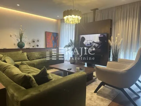 Modern and bright living room with a comfortable sofa and TV. - image 4