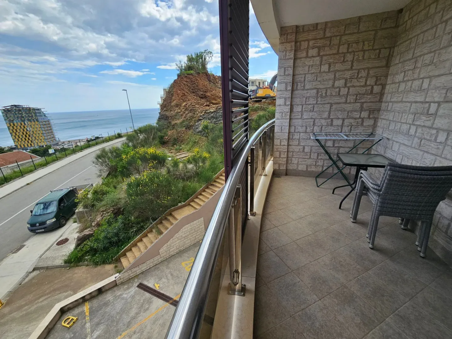 Furnished balcony with a sea view.
