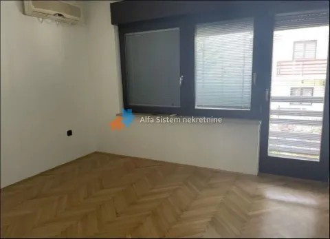 Empty room with parquet flooring, windows and a balcony door. - image 7
