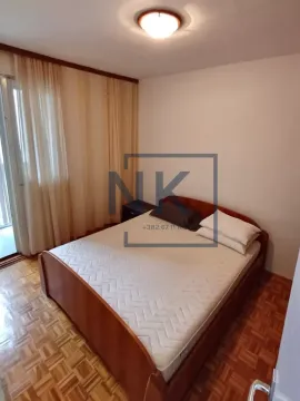 Bedroom with a double bed and access to the terrace. - image 6
