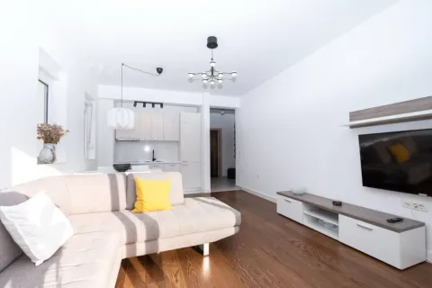 Modern and bright living room connected with dining area and kitchen. - image 3