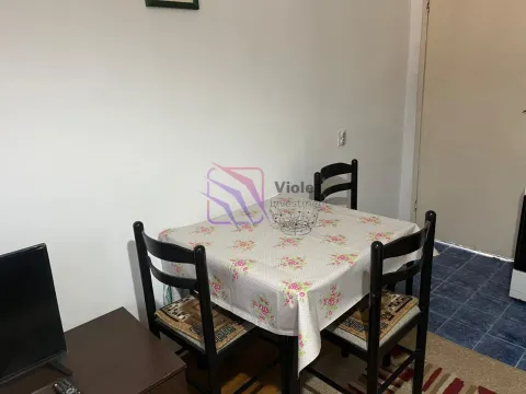 Smaller dining table with chairs in the living room. - image 5