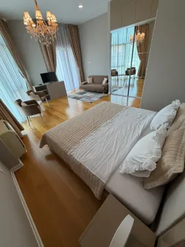 Spacious bedroom with a double bed, mirrored wardrobe, and access to the terrace. - image 6