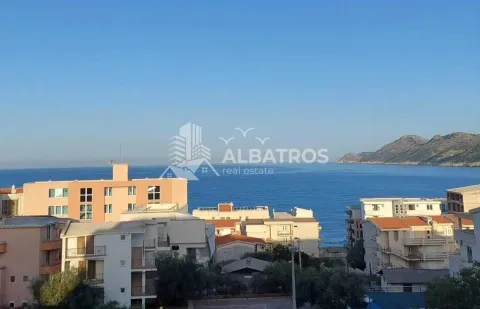 View of the sea and surrounding buildings from the property. - image 8