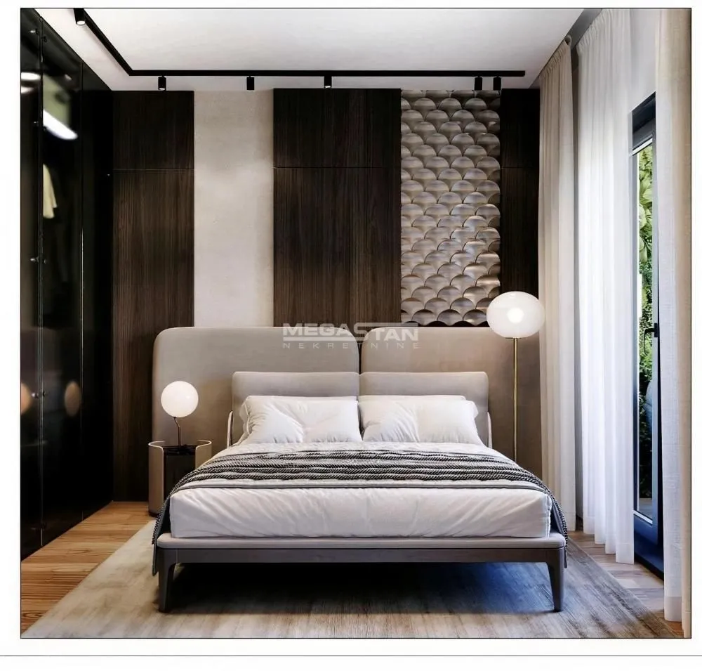 Modern bedroom with a double bed and decorative wall panels.
