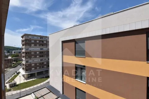 View of the building exterior and surrounding buildings from the terrace. - image 16