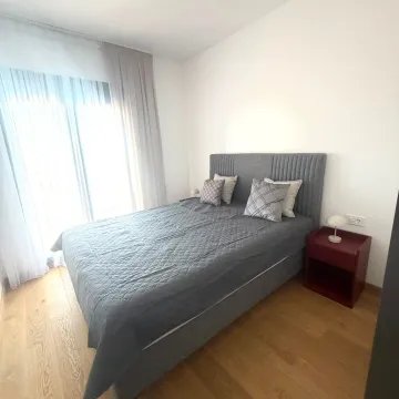 Modern bedroom with a double bed and access to the terrace. - image 6