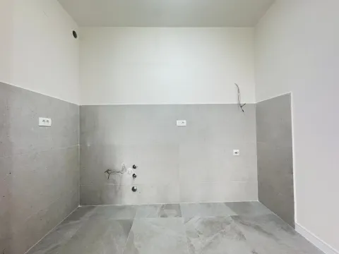Empty space intended for a kitchen with installed tiles and connections. - image 5