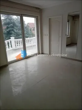 Empty room with access to the terrace and a large mirror. - image 3