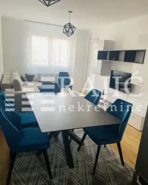 Living room with dining area and modern furniture. - image 11
