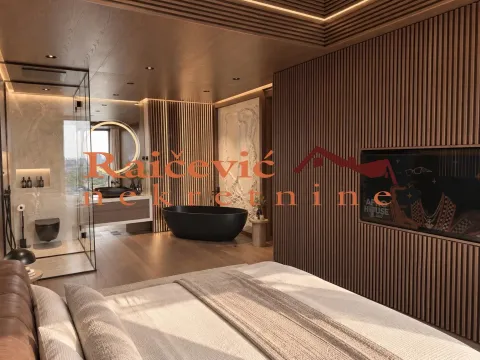 Spacious bedroom with an open-concept layout and integrated bathroom. - image 14
