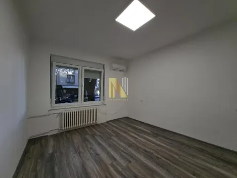 Empty un furnished room with a window and air conditioning. - image 5