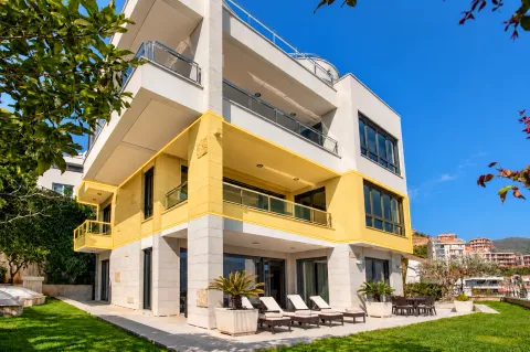Exterior of a modern residential building with terraces and a courtyard. - image 3