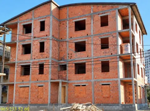 Exterior view of a residential building under construction with brickwork. - image 3