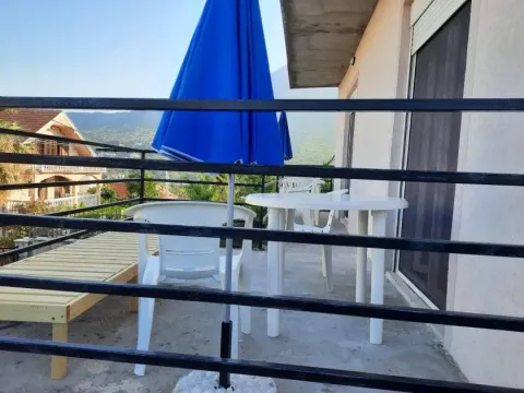 Terrace with seating furniture and a view of the surroundings. - image 5
