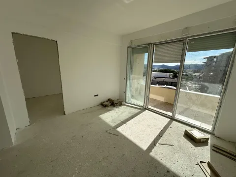 Unfurnished room under construction with access to the terrace and a view of the surroundings. - image 9