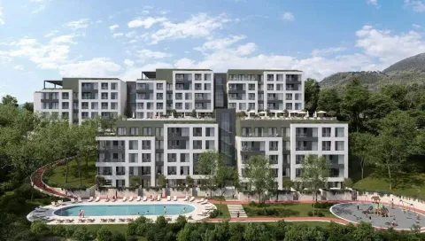 Exterior view of the residential complex with a swimming pool and landscaped courtyard. - image 23