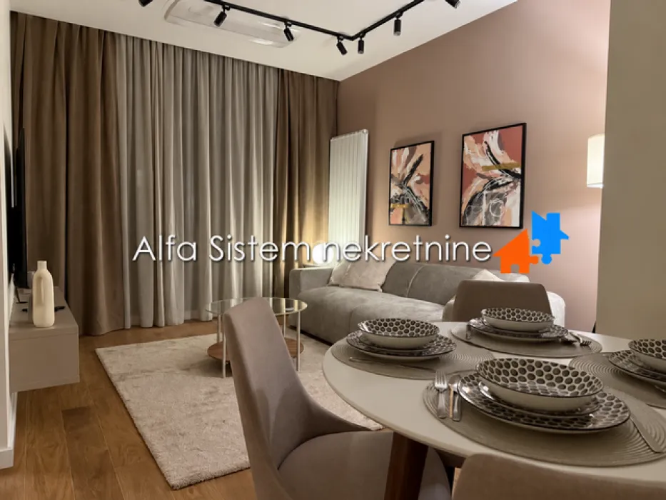 Modern living room with a dining area and sofa.