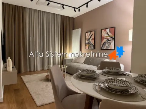 Modern living room with a dining area and sofa. - image 11