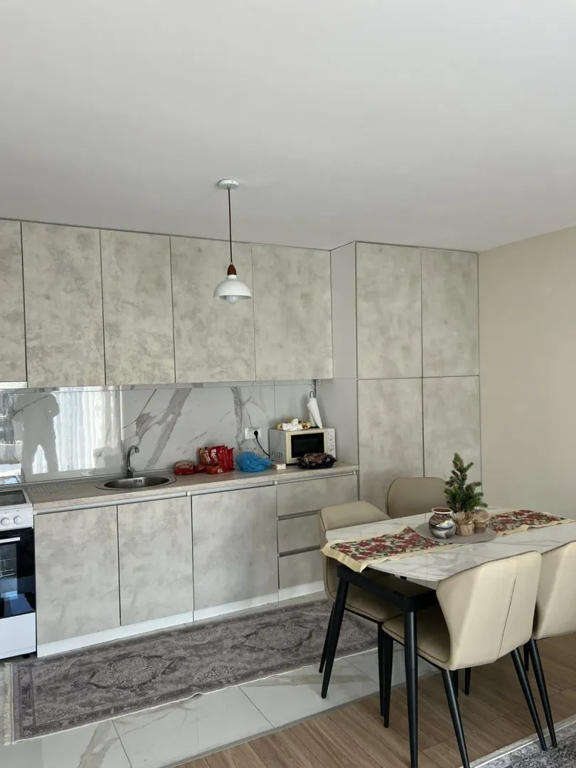 Bright kitchen with a dining table.