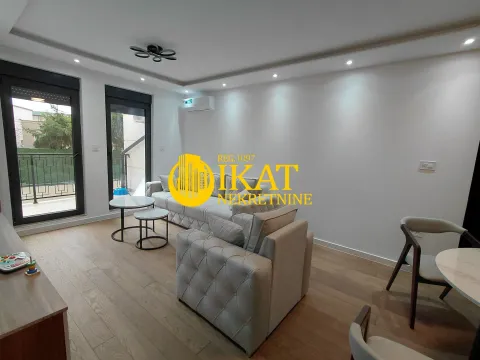 Living room with a sofa set and access to the terrace. - image 2