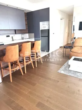 Modern living room with kitchen and bar. - image 3