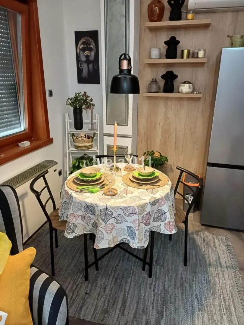 Dining table with chairs in the living room.