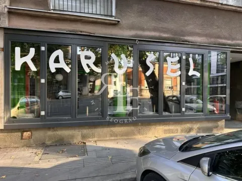 Exterior view of the commercial space with a large storefront. - image 2