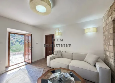 Living room with a sofa and access to the terrace. - image 2