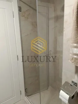 Modern bathroom with a shower cabin. - image 5
