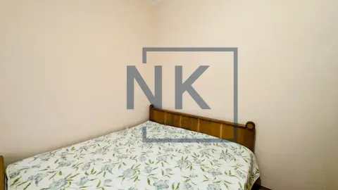 Small bedroom with a double bed. - image 4