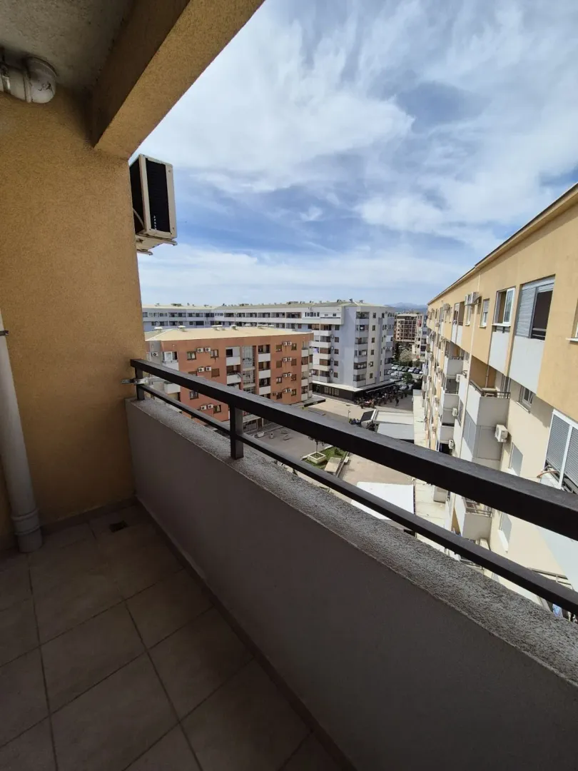 View from the balcony of surrounding residential buildings.