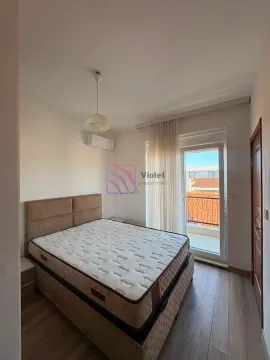 Bedroom with a double bed and access to the balcony. - image 8